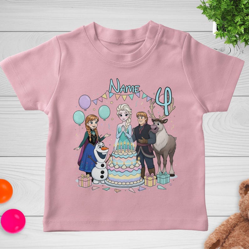 May include: Pink short-sleeved t-shirt featuring a colorful graphic of characters from a popular animated movie. The design includes a birthday cake, balloons, and the number 4. The word "Name" is also visible.