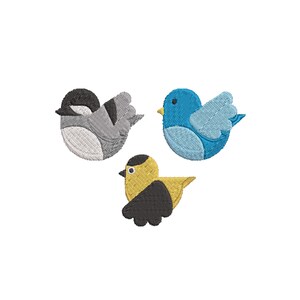 May include: Three embroidered birds in different colors and poses. A gray bird with a black head, a blue bird with a light blue wing, and a yellow bird with a black head and wing.