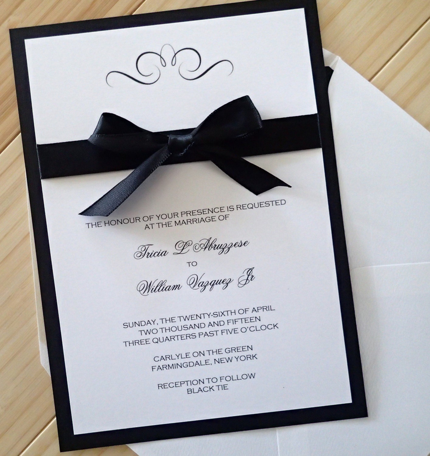 ribbon tied wedding invitations