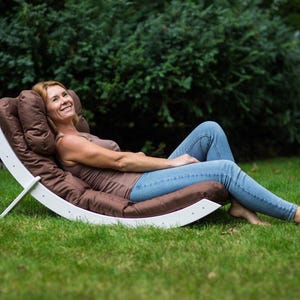 White Swinging Wave Cushioned Garden Chaise Lounge Chair Handcrafted luxury for your outdoor space total relaxation