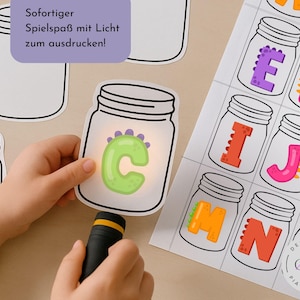 Letras de dinosaurios | Juego de bricolaje para niños con espectáculo de luces | Plantilla para imprimir en PDF juego infantil | Juego del abecedario | Juego educativo con linterna | Juego Montessori
