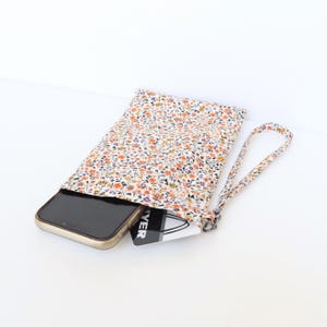 Bolsa de pulso para celular com tecido laranja Liberty – capa para celular com compartimento para cartão e alça removível combinando