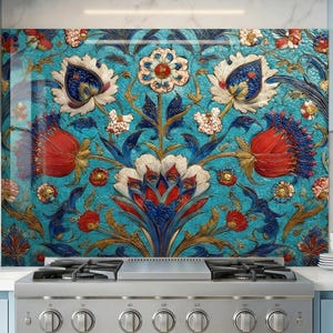 May include: A patterned kitchen splashback with a floral design in teal, red, white, and gold. The artwork features stylized flowers and leaves, providing a striking and colourful focal point for the kitchen.