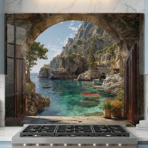 May include: A kitchen splashback depicting a coastal Italian scene. The image shows a stone archway overlooking a turquoise sea, boats, and cliffs. Potted plants are on the ledge, and the scene is framed by wooden shutters.