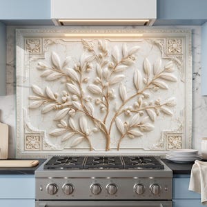 May include: A cream and gold decorative kitchen backsplash with a raised relief design of a tree with leaves and berries. The backsplash is set against a marble-effect background and framed with ornate detailing. The design is for a kitchen.