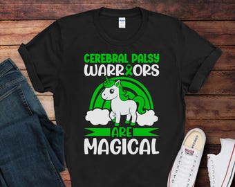 May include: Black t-shirt with a green ribbon, a unicorn, and the text "Cerebral Palsy Warriors Are Magical".