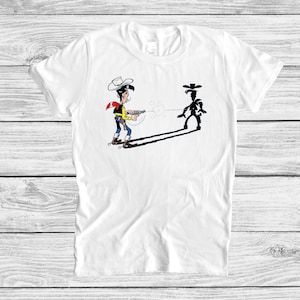 Vintage Belgische cartoon cowboy-T-shirt, Lucky Cowboy Luke Shootout With The Shadow, grappig pistool-T-shirt, grafische cowboyhoed kinderen wildwesten shirt
