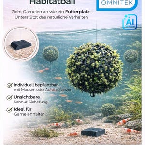 May include: A black, spherical, lattice-structured habitat ball for aquariums, featuring green moss growing within the grid. It is attached to a thin, vertical line anchored by a black, rectangular base, designed for shrimp to inhabit.