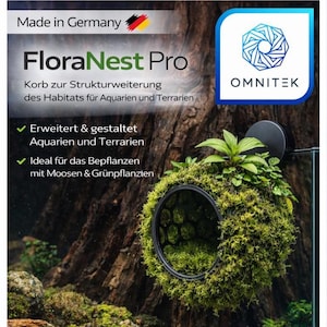 May include: A circular, moss-covered aquarium decoration with a black frame, displaying the text "FloraNest Pro" and "Made in Germany." Designed for aquariums and terrariums, it's intended for plants and moss.