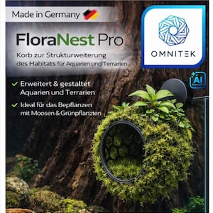 Könnte beinhalten: Eine FloraNest Pro Habitatstruktur für Aquarien und Terrarien mit einem kreisförmigen schwarzen Rahmen, der mit grünem Moos und kleinen Pflanzen bewachsen ist, sowie einer schwarzen Befestigungsscheibe und dem Omnitek-Logo.