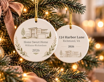 May include: Two round white ceramic ornaments hanging from gold strings. The left ornament features a line drawing of a house, the text Home Sweet Home, Williams-Richardson, and 2026. The right ornament displays 124 Harbor Lane, Richmond, VA, and 2026.