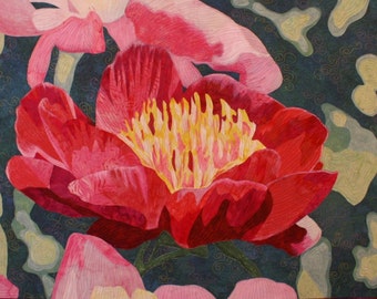 May include: A close-up of a red peony flower with a yellow center. The flower is in focus, while the background is blurred and features a dark blue and green pattern.