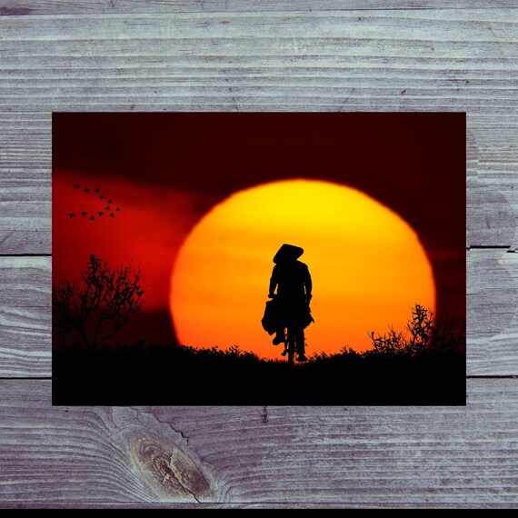 Postcard / Cyclist at sunset