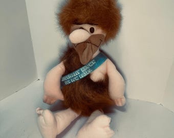 Mascota publicitaria de peluche vintage de Lenny Caveman de la compañía de alquiler de coches Thrifty, juguete retro de los años 90