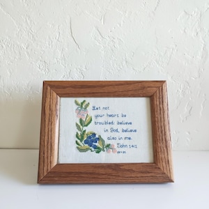 Handmade floral needlepoint embroidery with John 14:1 Bible verse in wooden frame