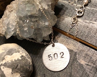 Srebrny naszyjnik z kodem obszarowym