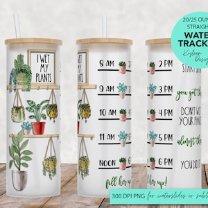 Puede incluir: Un vaso blanco de 20/25 onzas para el seguimiento del agua, con tapa de bambú y una pajita. El vaso tiene un diseño de plantas en macetas y el texto "I wet my plants". El vaso también tiene un rastreador de agua con horarios de 8 AM a 6 PM.