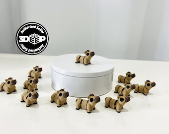 May include: A collection of small, tan and brown zebra figurines. The zebras have black eyes and are arranged on a white surface, with one on a white platform. The image includes a logo that says "Authorized Seller 3D E P".