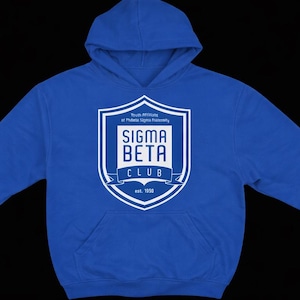 May include: Royal blue hoodie with a front pocket and a white emblem. The emblem features the words "SIGMA BETA CLUB" and "est. 1950" within a shield design. A casual hooded top.
