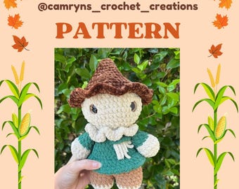 May include: A crochet scarecrow pattern with the text "SCARECROW PATTERN" and the seller's social media handle. The scarecrow is beige, brown, and green, with a hat, shirt, and pants. The image has a fall theme with leaves, corn stalks, and a pumpkin.