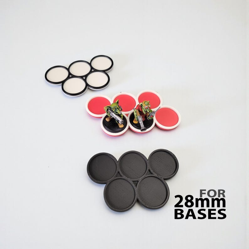 Miniature base movement tray for moving miniatures around tabletop gaming boards.