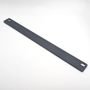 May include: A matte black metal bar with rounded corners and two holes, one at each end. The bar is rectangular and has a slightly textured surface, likely for grip or aesthetic purposes. The item is shown against a white background.