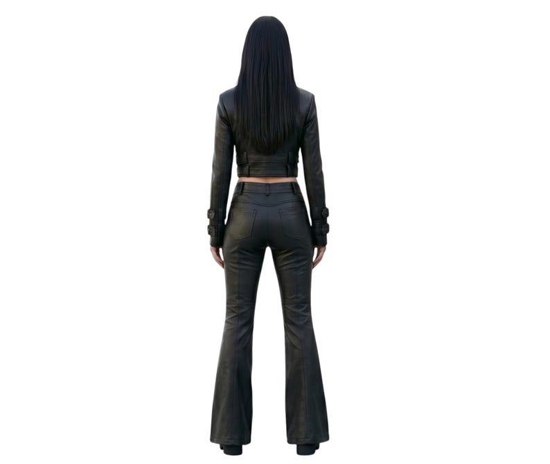 May include: A black leather outfit consisting of a cropped long-sleeve jacket and matching flared trousers. The jacket features a fitted silhouette, while the trousers have a high-waisted design with a flared leg cut, both in a solid black finish.
