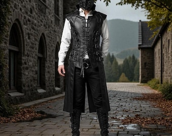 May include: A black leather vest with a long, flowing design, featuring multiple buckles and a lace-up front. The vest is paired with black trousers, boots, and a matching mask. The outfit has a gothic or steampunk aesthetic.