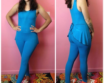 Größe klein bis groß | Vintage 1980er Deadstock / NWT Cerulean Blue Stirrup Jumpsuit von Kat Kollege