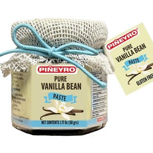 May include: A jar of Piñeyro Pure Vanilla Bean Paste, net contents 1.77 oz (50 grs). The jar is sealed with a white mesh fabric and tied with a light blue string. A label indicates the product is gluten-free.