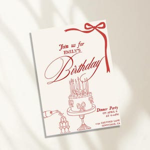 Peut inclure: Invitation &agrave; un d&icirc;ner d'anniversaire rouge et blanc avec un ruban rouge et un dessin d'un g&acirc;teau avec des bougies et une bouteille de champagne qui se verse dans un verre.