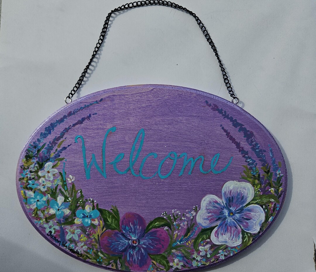 Oval Wooden Welcome Sign With Pansies. Purple Shimmer Background ...