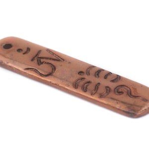 Copper Elongated Om Pendant 50mm: Yoga Mantra Meditation Jewelry Supplies, Wholesale Pricing, Genuine & Authentic Design