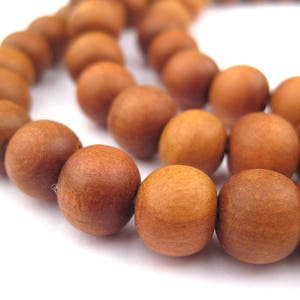 108 Natural Sandalwood Mala Beads: 10mm Mala Strand Yoga Meditation Wood Mala Beads Nepal Wood Beads Brown Mala Beads (WOD-RND-BRN-933)
