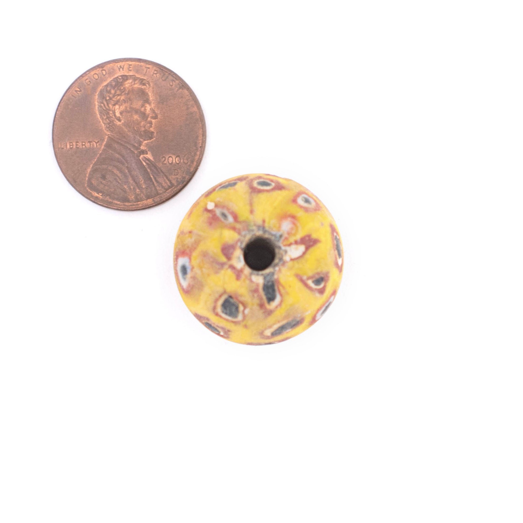 Analysis of two glass eye (Jatim) beads unearthed from the