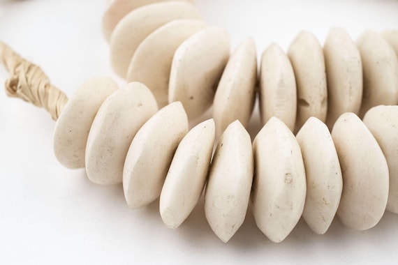 NATURAL SAUCER BONE BEAD