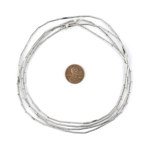 Minimalistiska glänsande silverpärlor i rörform: Vit metall 1,5 mm pärltillbehör bild 2