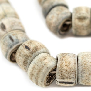 CARVED GREY BONE BEADS