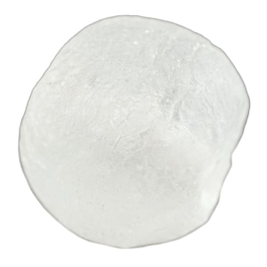 May include: A close-up of a smooth, translucent, white, rounded object. The object has a slightly irregular shape and a textured surface, appearing soft and cloud-like against a white background. The object is likely a natural stone or mineral.