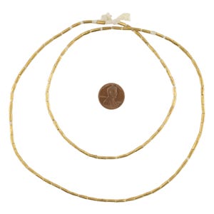 100 perline etiopi in ottone tubolare 8 x 2 mm - Perline africane in ottone - Materiali per la creazione di gioielli - Prodotte in Etiopia ** (MET-TUB-BRS-237) immagine 2