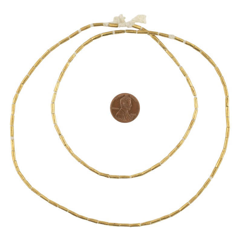 100 perline etiopi in ottone tubolare 8 x 2 mm - Perline africane in ottone - Materiali per la creazione di gioielli - Prodotte in Etiopia ** (MET-TUB-BRS-237) immagine 2