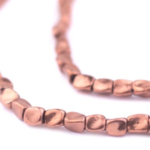 130 kopparfärgade tvinnade nuggetpärlor 4 mm: Metalldistanspärlor Etniska metallpärlor Boho kopparpärlor Ovanliga kopparpärlor 4 mm kopparpärlor
