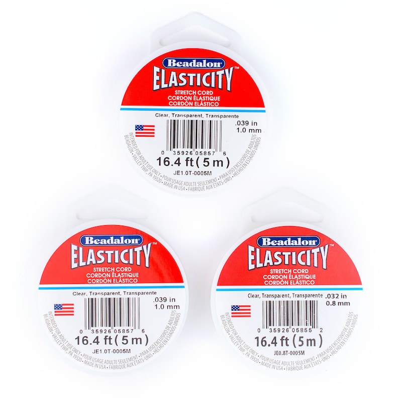 Puede incluir: Tres carretes de cord&oacute;n el&aacute;stico Beadalon Elasticity transparente y claro. Cada carrete est&aacute; etiquetado con el nombre de la marca, el nombre del producto y el tama&ntilde;o: 16,4 pies (5 m), 0,039 pulgadas (1,0 mm) y 16,4 pies (5 m), 0,032 pulgadas (0,8 mm).