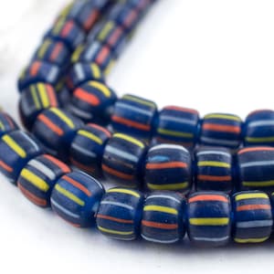 May include: A strand of blue glass beads with white, yellow, and orange stripes. The beads are cylindrical and have a glossy finish.