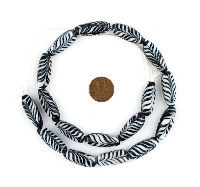 The Bead Chest Black Glass Feather Beads - 10mm Indonesia Oval With Large Hole