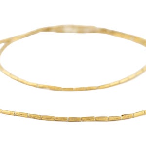 100 perline etiopi in ottone tubolare 8 x 2 mm - Perline africane in ottone - Materiali per la creazione di gioielli - Prodotte in Etiopia ** (MET-TUB-BRS-237) immagine 4