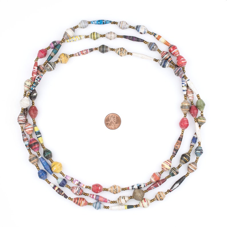 May include: A multi-strand necklace made of colorful paper beads. The beads are rolled from strips of paper and are various sizes and shapes. The necklace is approximately 30 inches long.