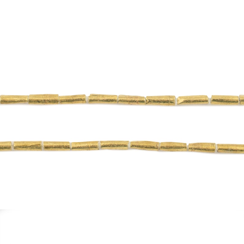 100 perline etiopi in ottone tubolare 8 x 2 mm - Perline africane in ottone - Materiali per la creazione di gioielli - Prodotte in Etiopia ** (MET-TUB-BRS-237) immagine 3