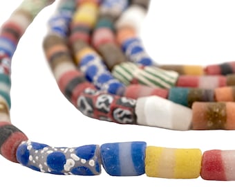 May include: A close-up of a colorful glass bead necklace. The beads are cylindrical and have a variety of patterns and colors, including blue, red, yellow, white, and brown.