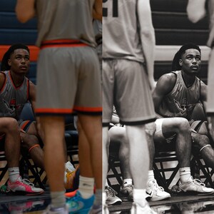 May include: A black and white photo of a basketball team. The team is sitting on a bench. One player is wearing a jersey with the number 15 on it. The player is looking off to the side.